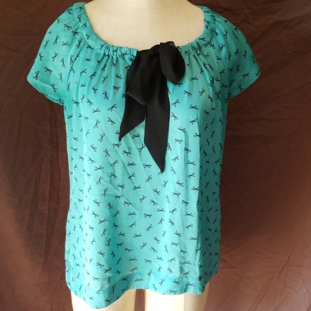 Loft blouse. Black bows design.